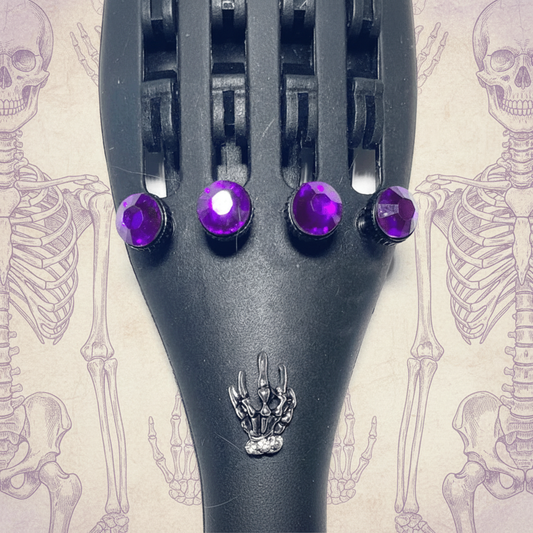 Skeleton Hand — Purple Editorial Light